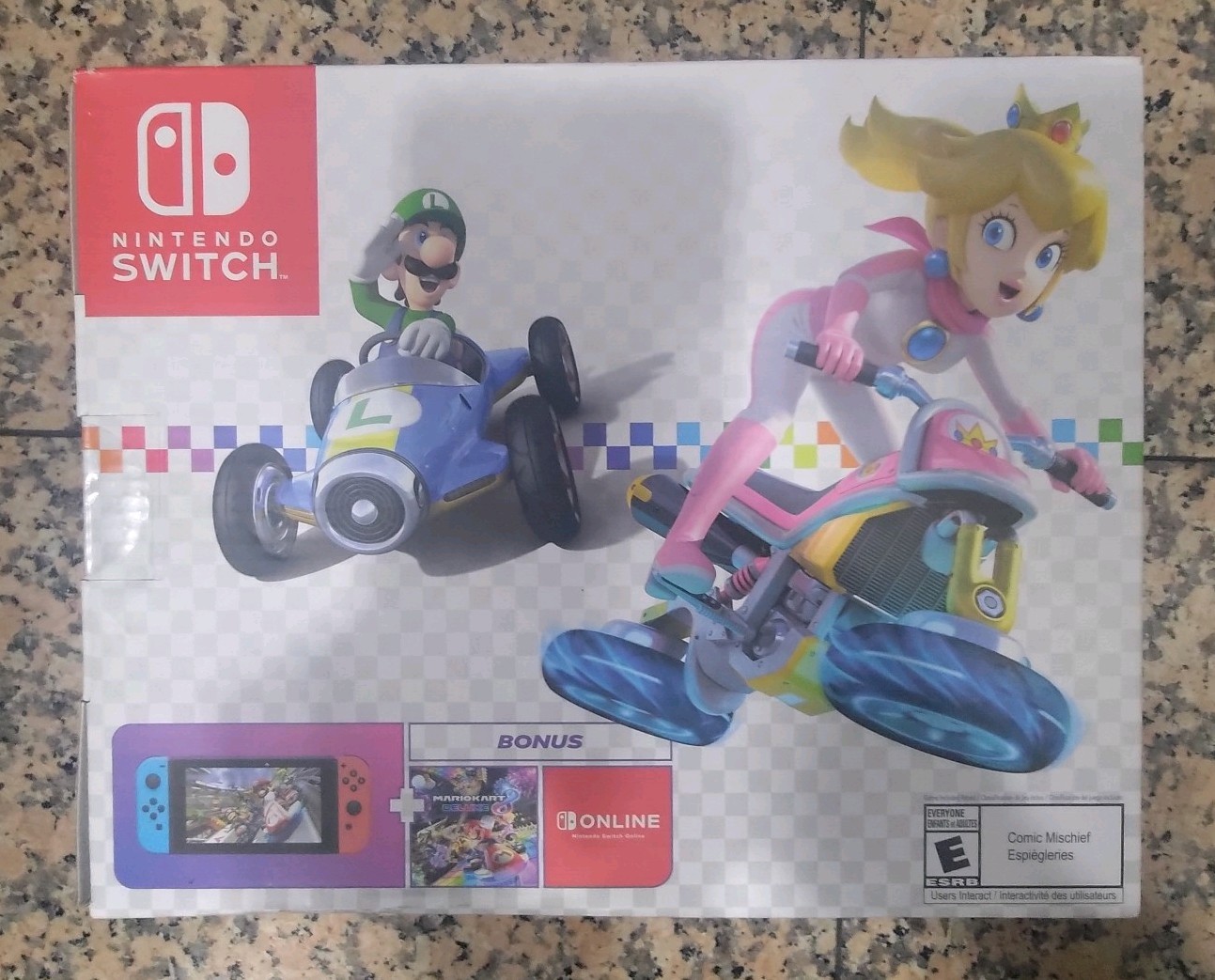 New Nintendo Switch + Mario Kart 8 Deluxe Console Bundle + 12 month Subscription
