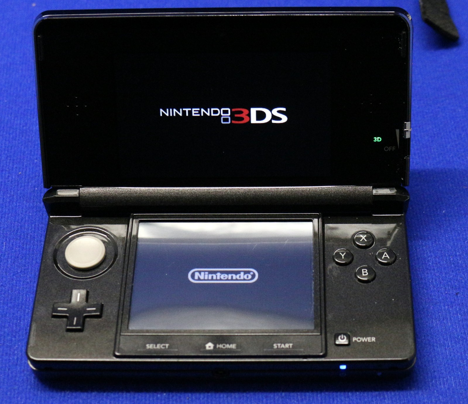 Nintendo 3DS Cosmo Black Console Case, Earbuds, 1 stylus, Charger + 4 Games