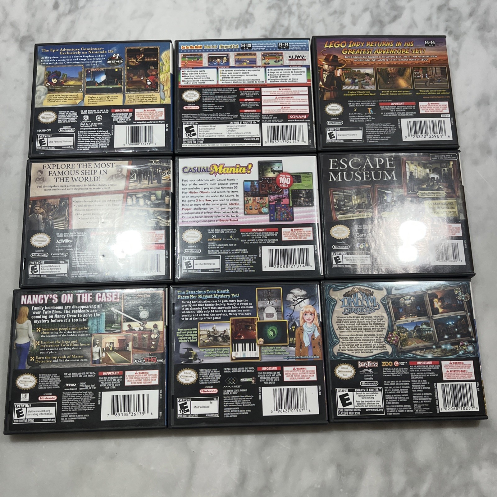 Nintendo DS Lite Cobalt Blue Console Bundle 9 Games New Battery Charger Cases