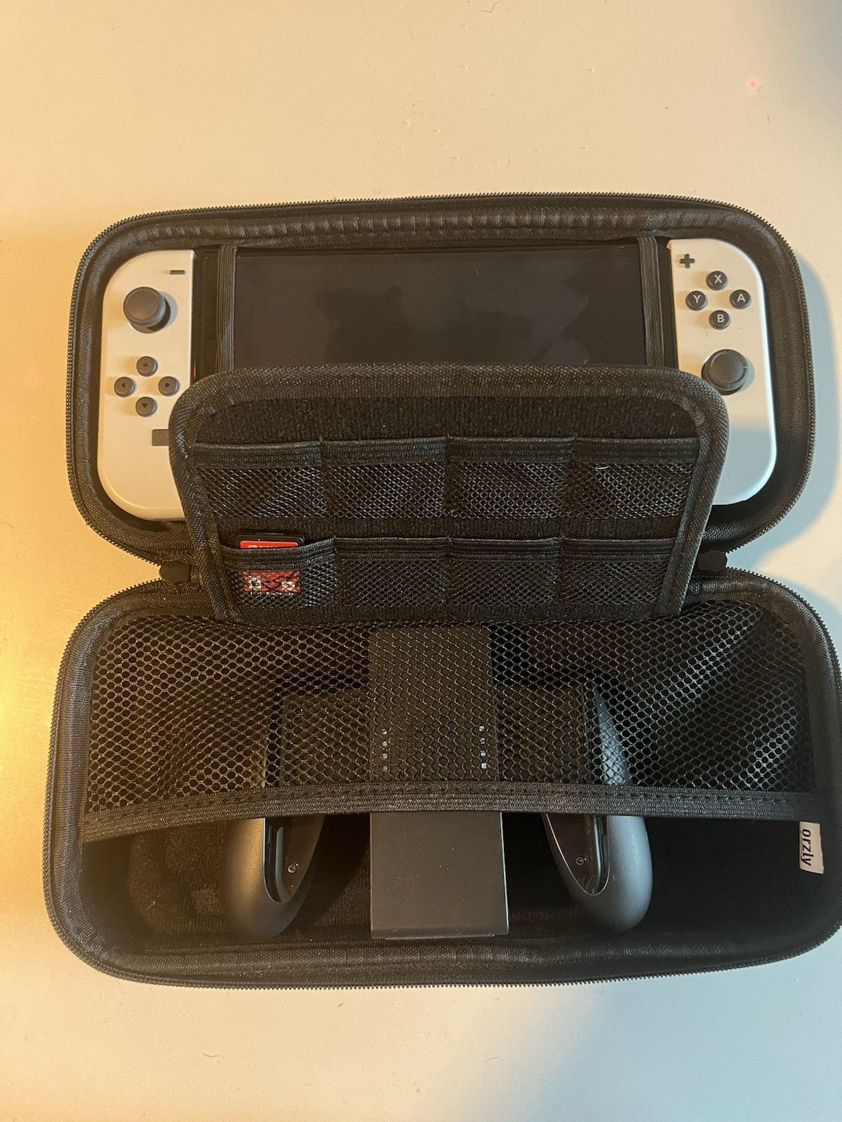 Nintendo Switch OLED Model 64GB 1080p White Joy-Cons w/ Black Carry Case