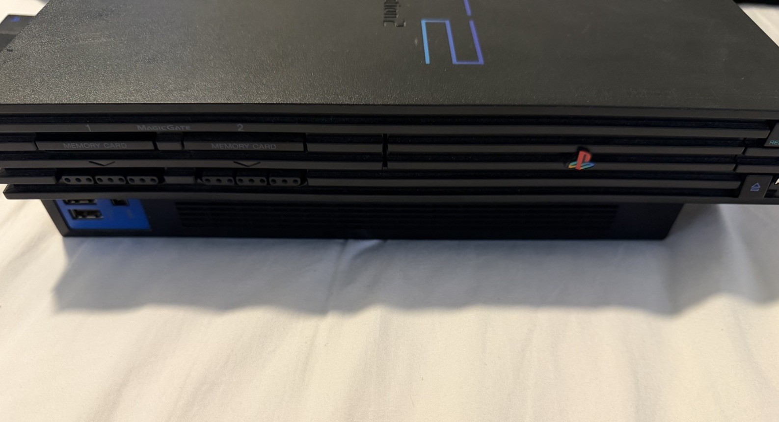 Sony PlayStation 2 Console – Black (SCPH-30001) With 6 Games, 2 Controllers