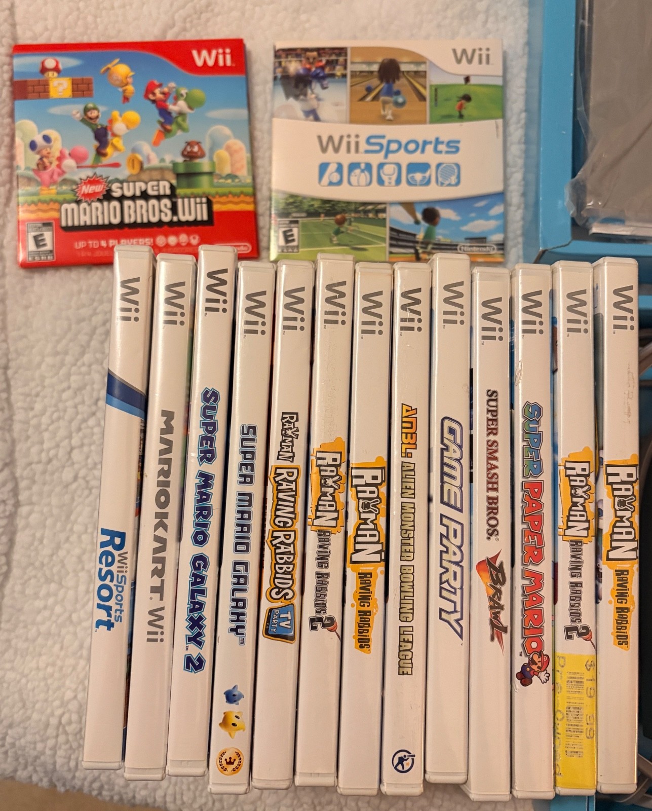 Nintendo wii with box and instructions, 15 games, rabbids charger plus more