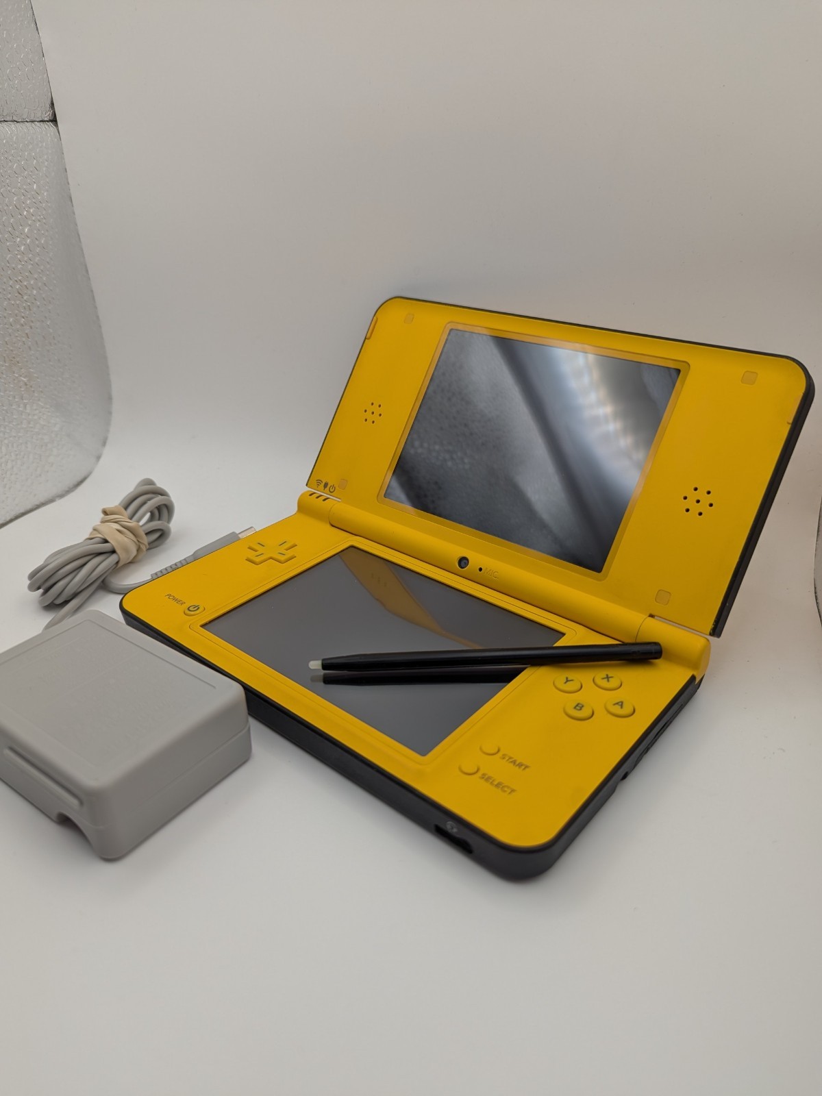 Nintendo DSi LL Yellow Handheld Console With AC Adapter – working minor damage