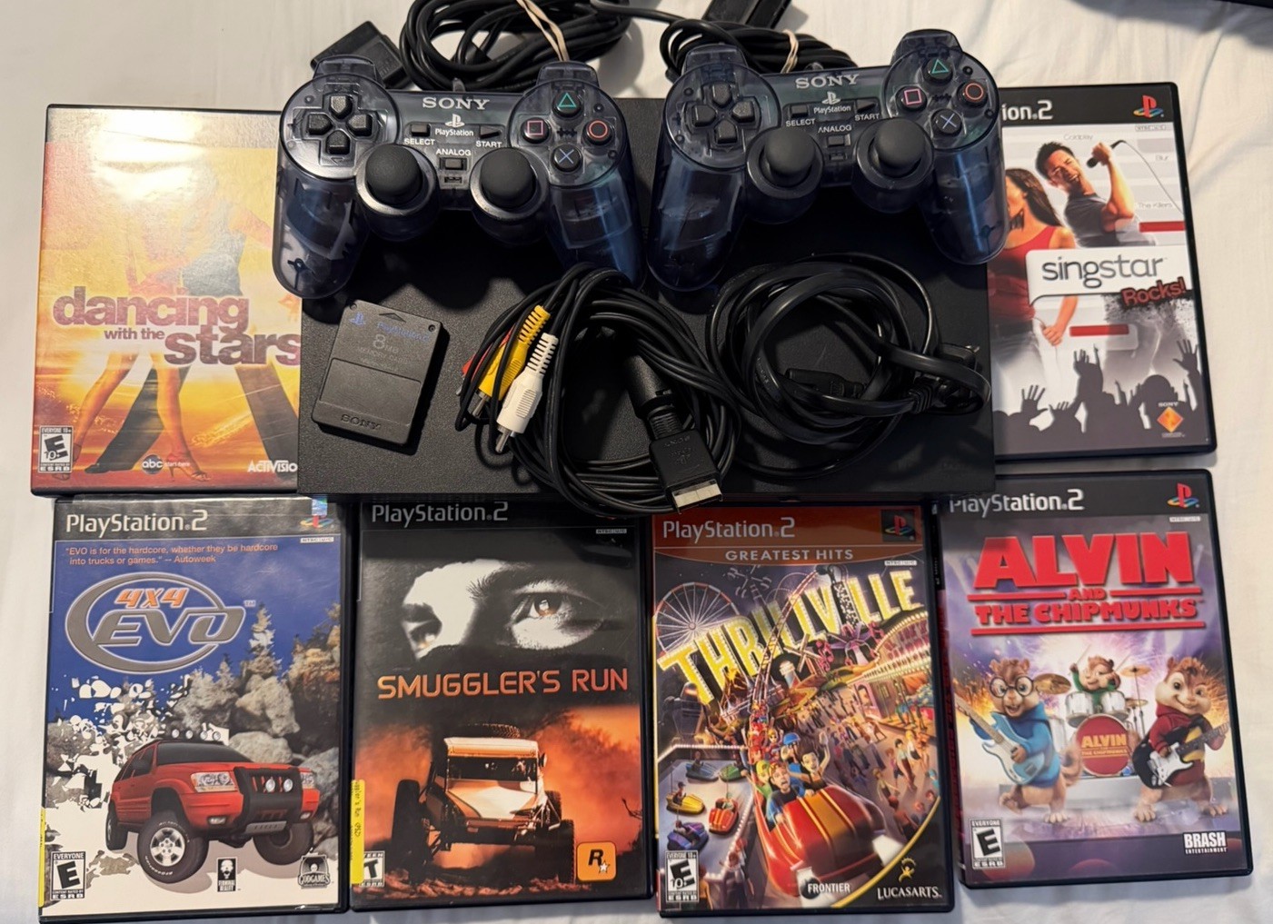 Sony PlayStation 2 Console – Black (SCPH-30001) With 6 Games, 2 Controllers
