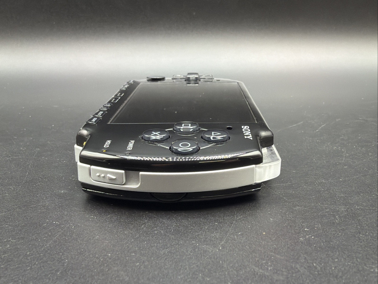 PSP 2001 Console W/Memory Stick 2GB AND CHARGER Working/ tested. W/ Loco Roco