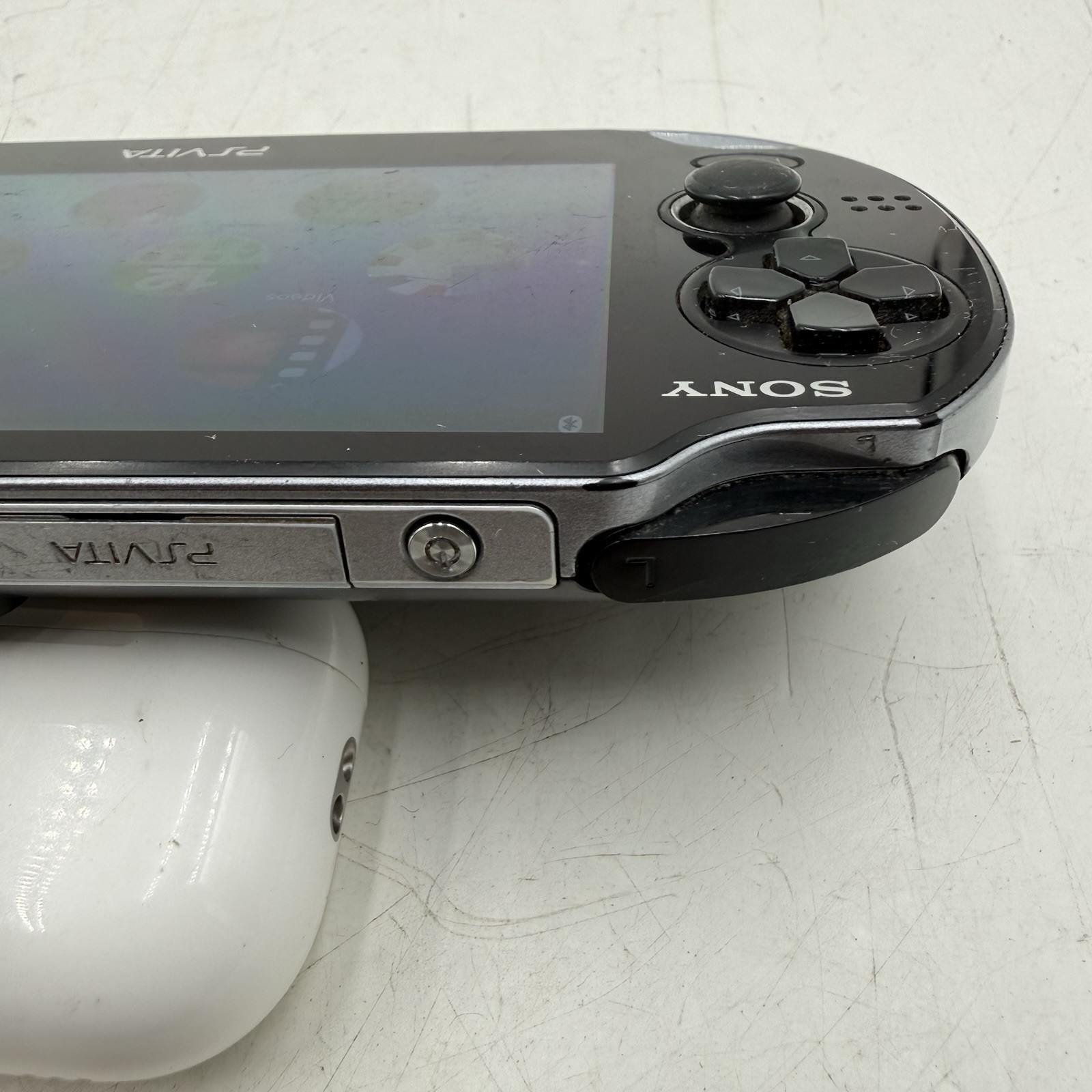 Sony PlayStation PS Vita PCH-1001 Black Handheld Console. With 2 Game Downloaded