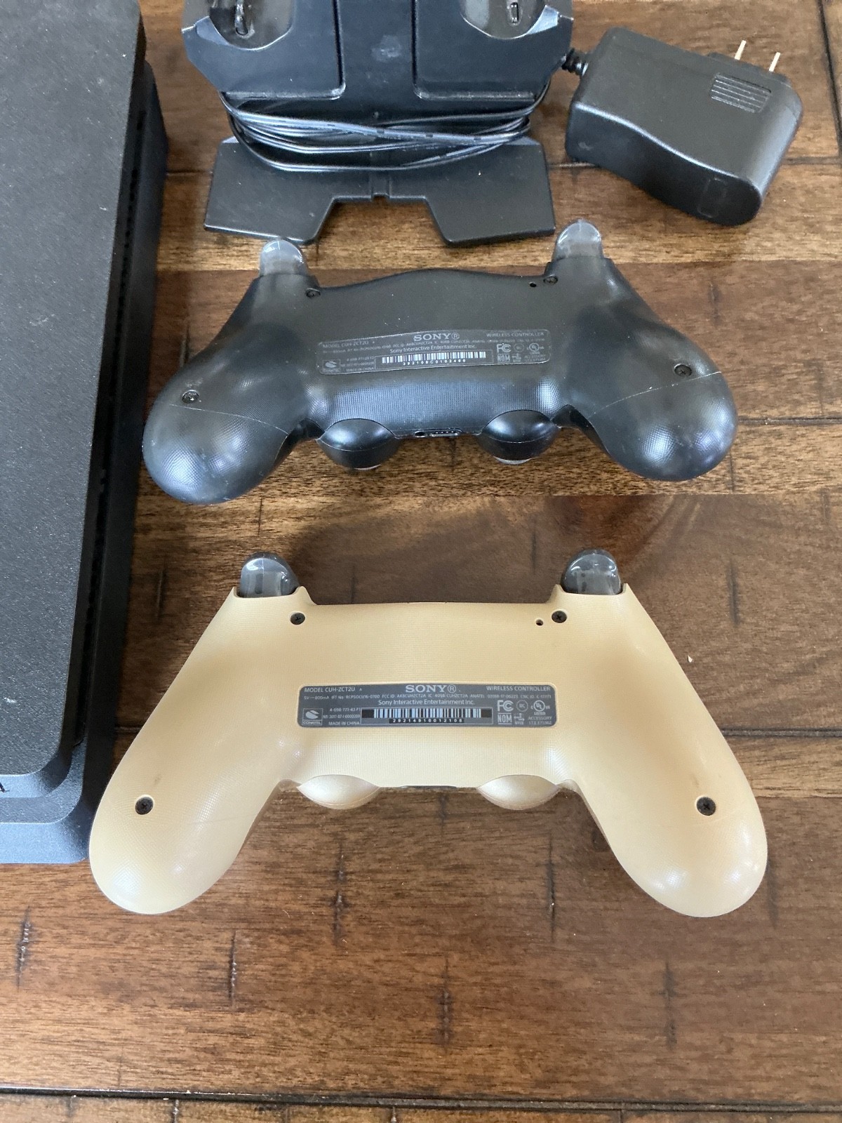Sony PlayStation 4 Slim Console, two Controllers, Controller Dock and cables