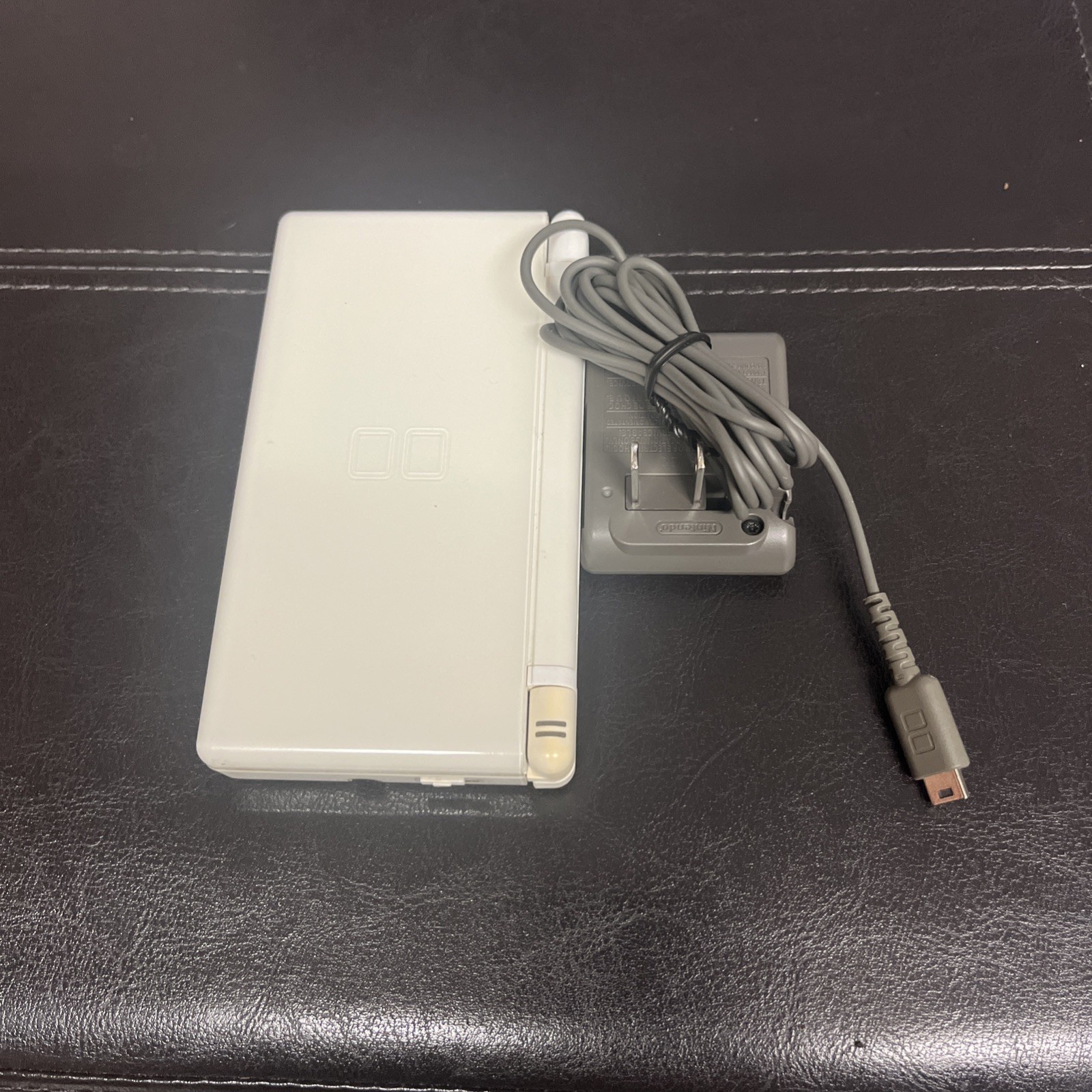 Nintendo DS Lite Handheld System USG-001 White with Charger Stylus Not Included