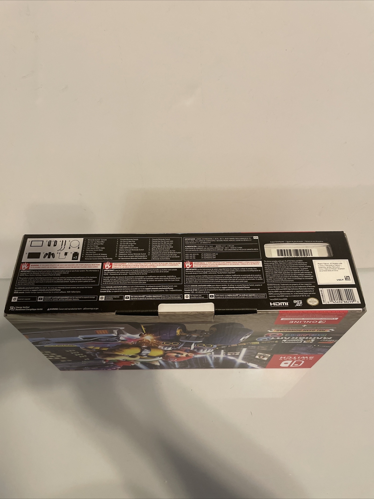 Nintendo Switch with Blue and Red Joy-Con Controllers and Mario Kart 8 Bundle