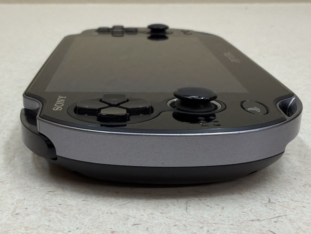 Sony PlayStation Vita Black PCH-1001 OLED With Original Charger and Case