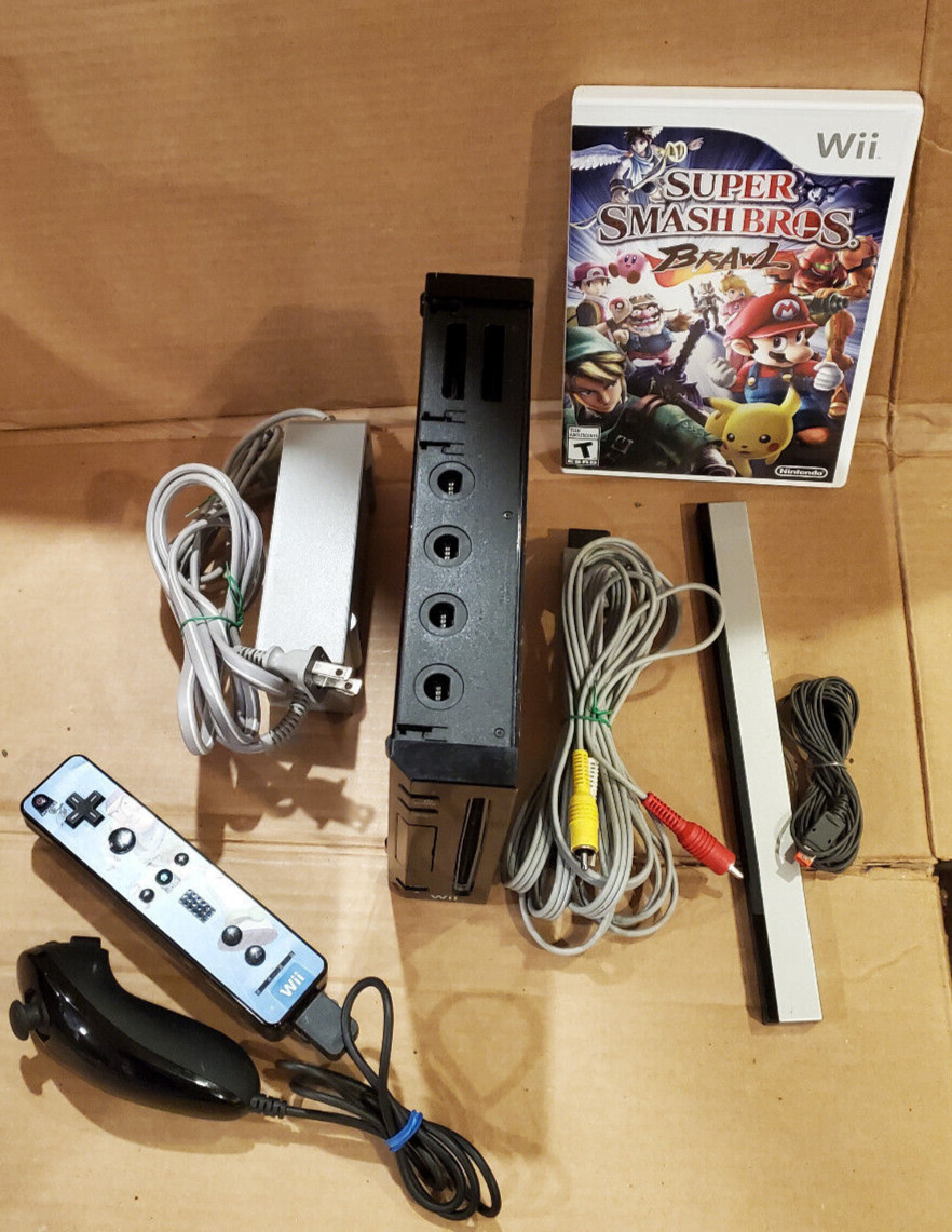 Nintendo Wii Console in Black, Gamecube Compatible + super smash bros brawl game