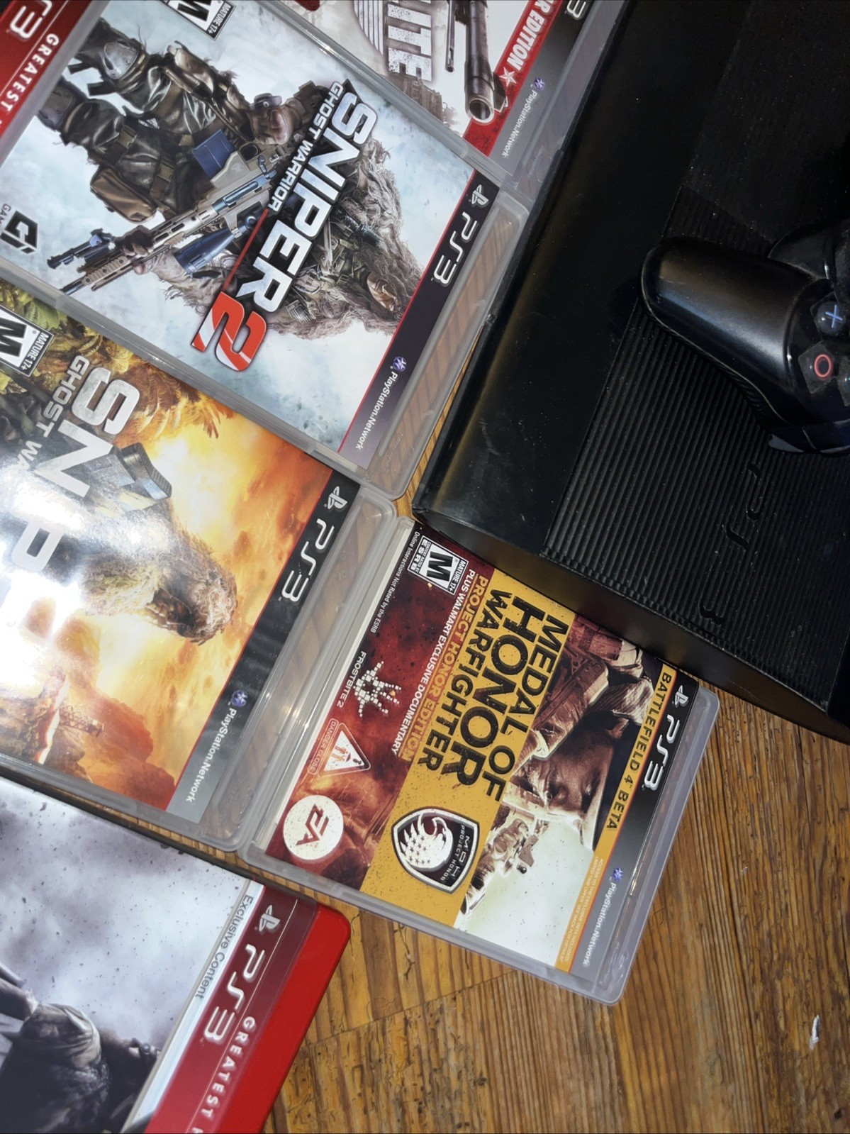 Sony PlayStation 3 Super Slim CECH-4001B 250GB Black Games Controller Bundle