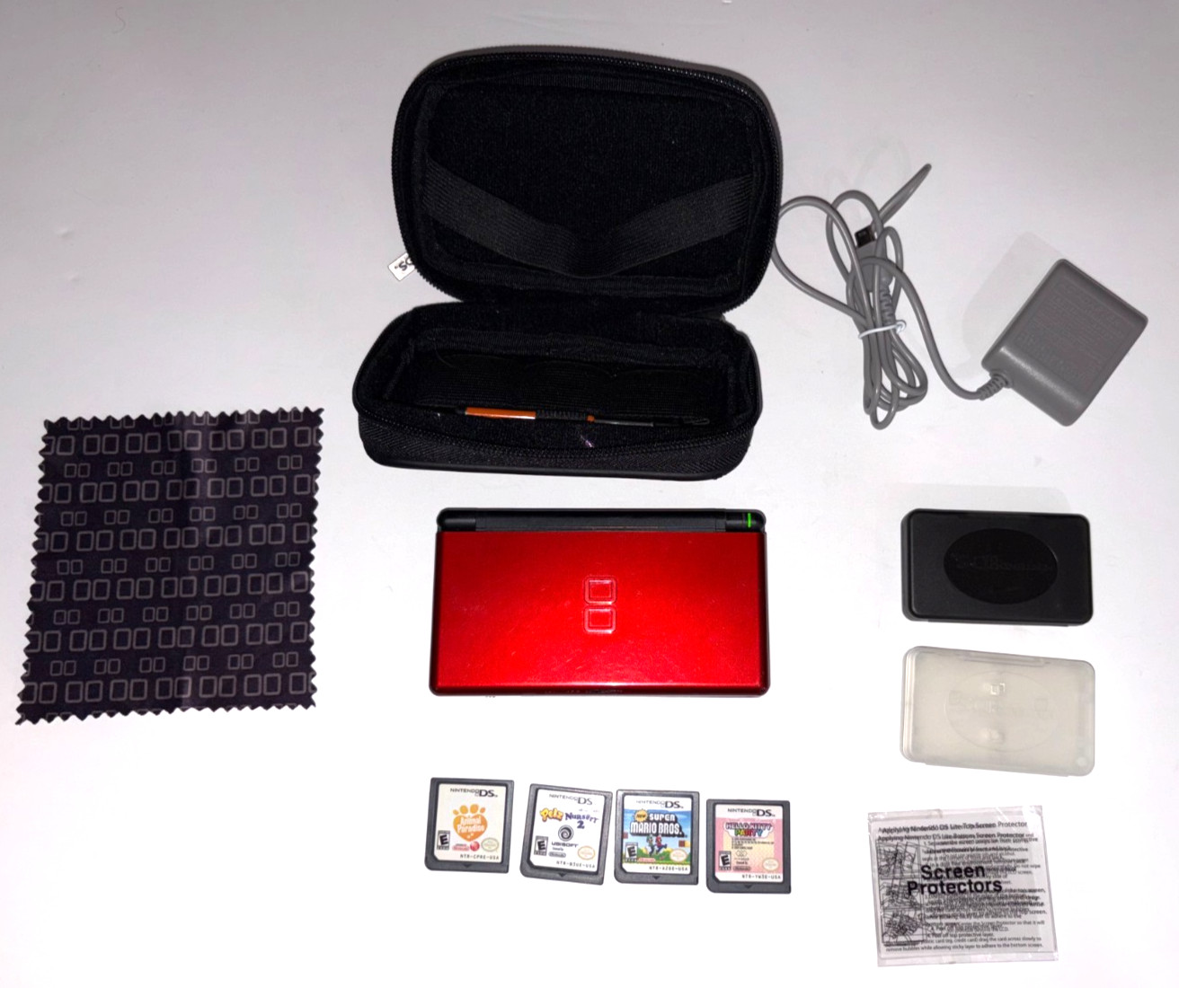 Nintendo DS Lite Red with Case, Stylus, Charger, Case, Protectors & 5 Games