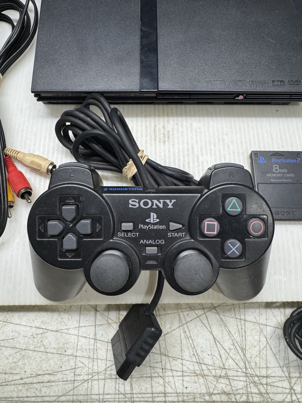 Sony PlayStation 2 Slim Black OEM with 1 Controller, 8MB Memory Card – Tested