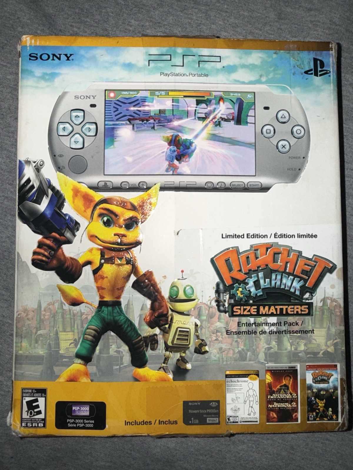 Sony PSP-3000 Silver Ratchet & Clank Size Matters Entertainment Pack Wi-Fi 1GB