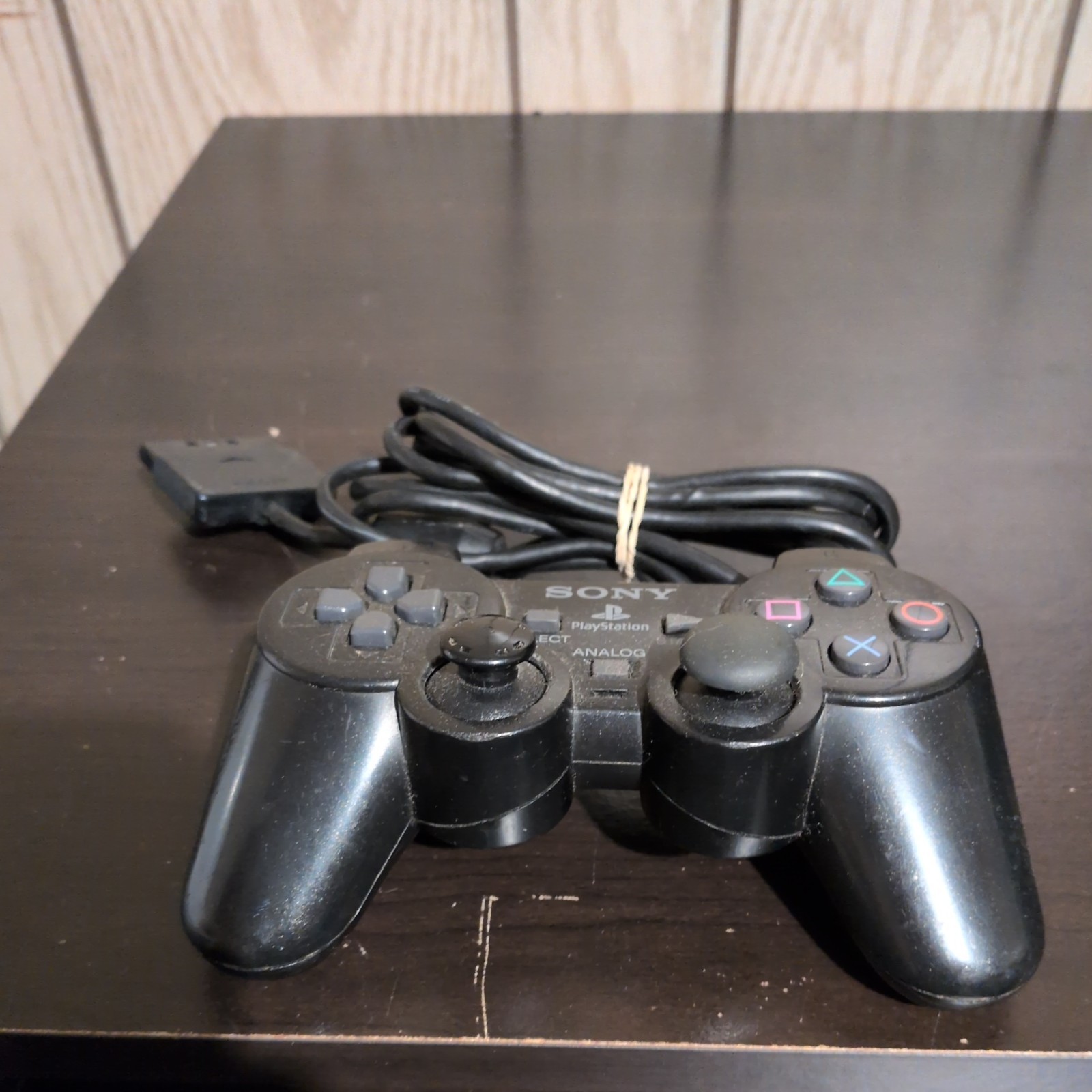 2 Sony PlayStation Consoles (w/Controllers, Cable, & 2 8MB Memory Cards)