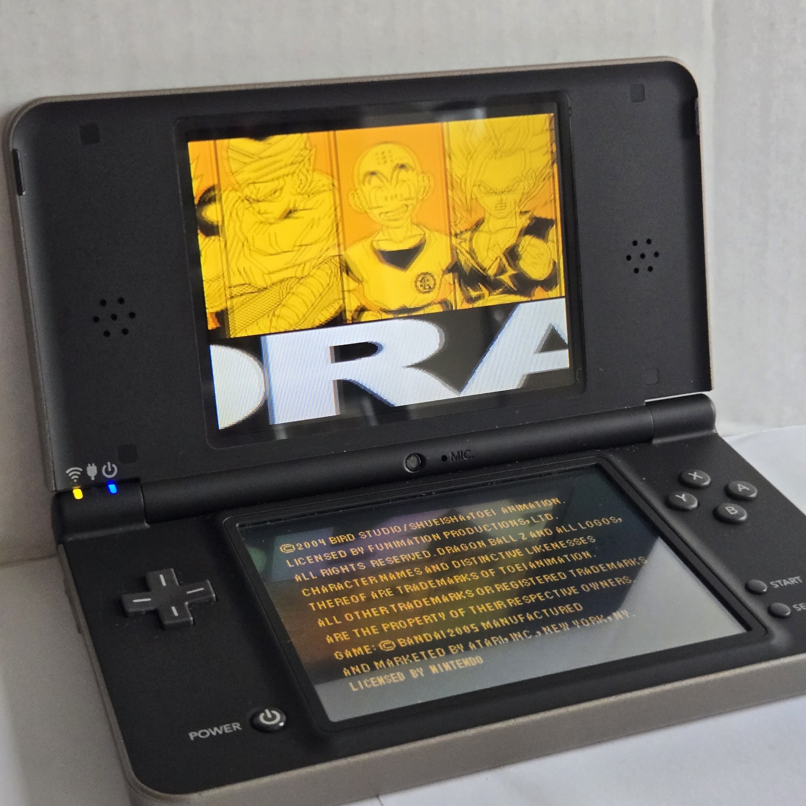 Nintendo DSi XL Bronze/Black Handheld Console Wi-Fi UTL-001 NTSC-U/C