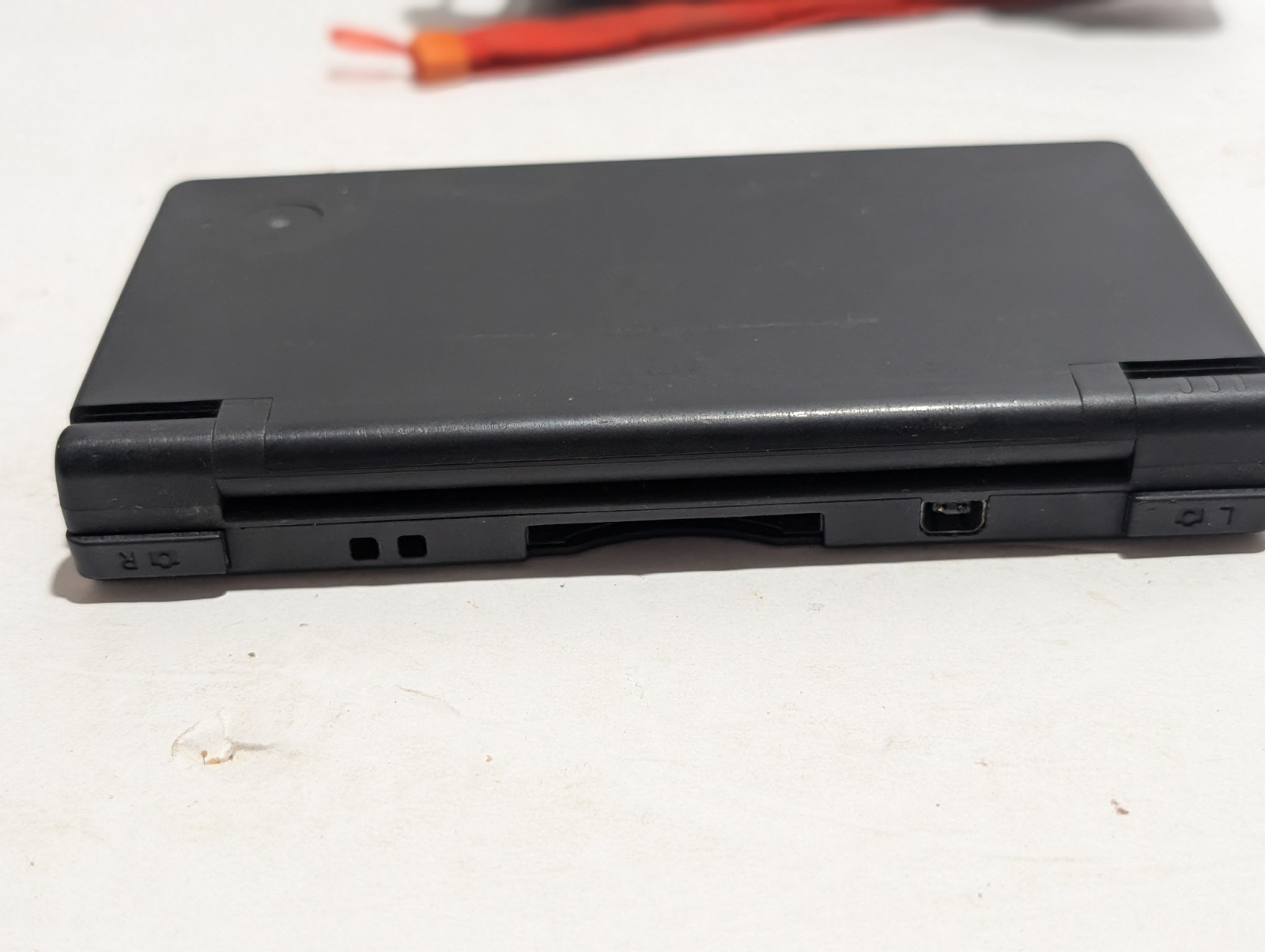 Nintendo DSi Bundle (DSi + NERF Case + Charger + Stylus + Game)