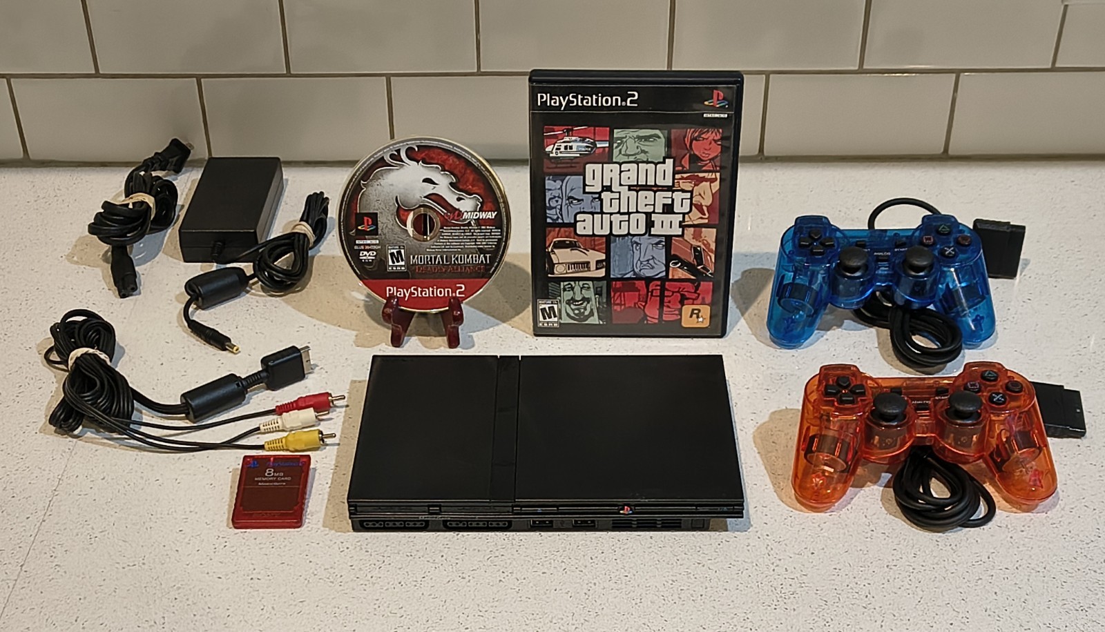 Sony PlayStation 2 PS2 Slim SCPH-77001 Console + Games, New Controllers – TESTED