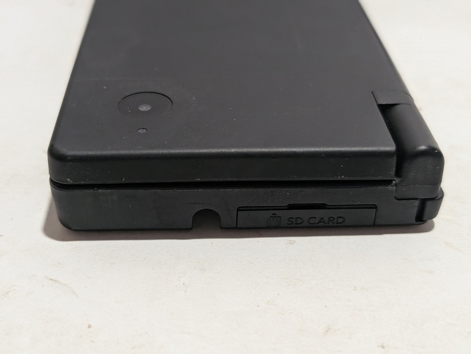 Nintendo DSi Bundle (DSi + NERF Case + Charger + Stylus + Game)