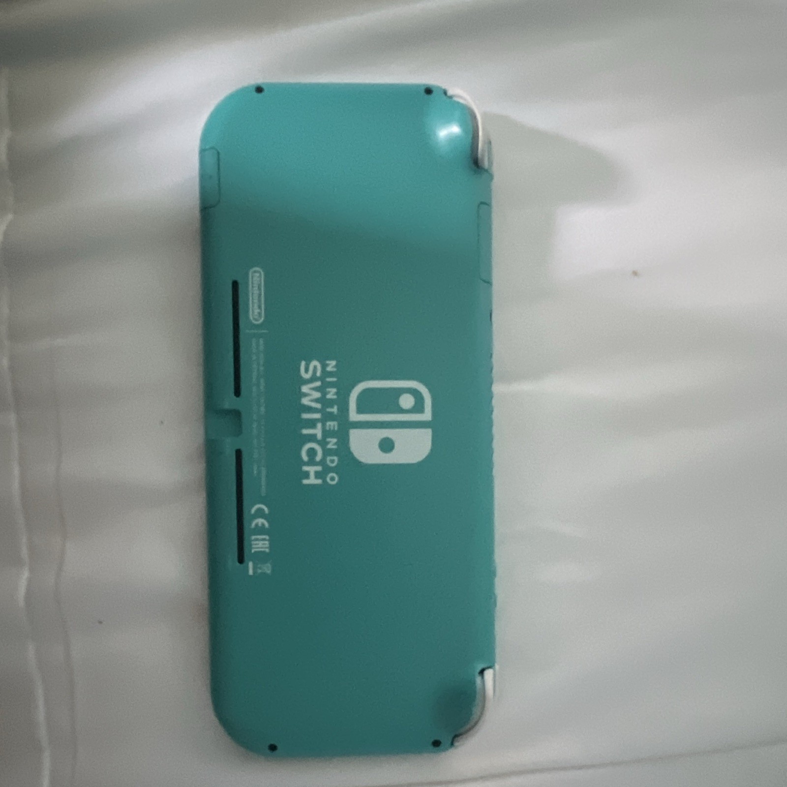 Nintendo Switch Lite Turquoise Handheld Console Wi-Fi Capability Headphone Jack