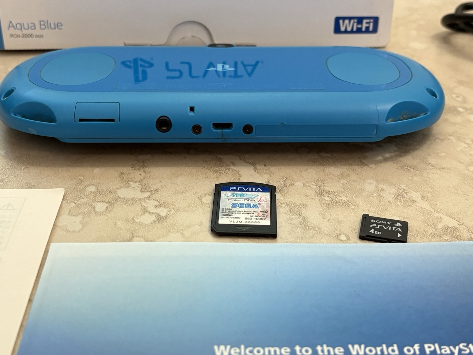 Sony PS Vita PCH-2000 Complete In Box – Aqua Blue 4GB Very Good Condition