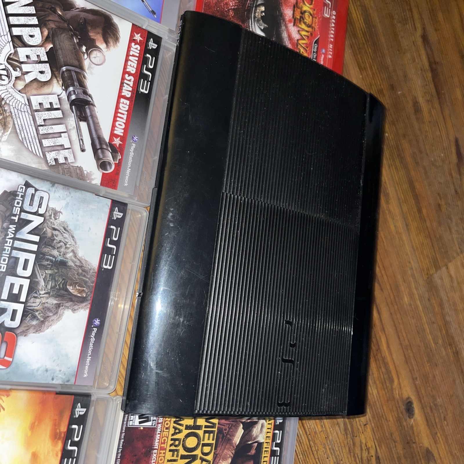 Sony PlayStation 3 Super Slim CECH-4001B 250GB Black Games Controller Bundle