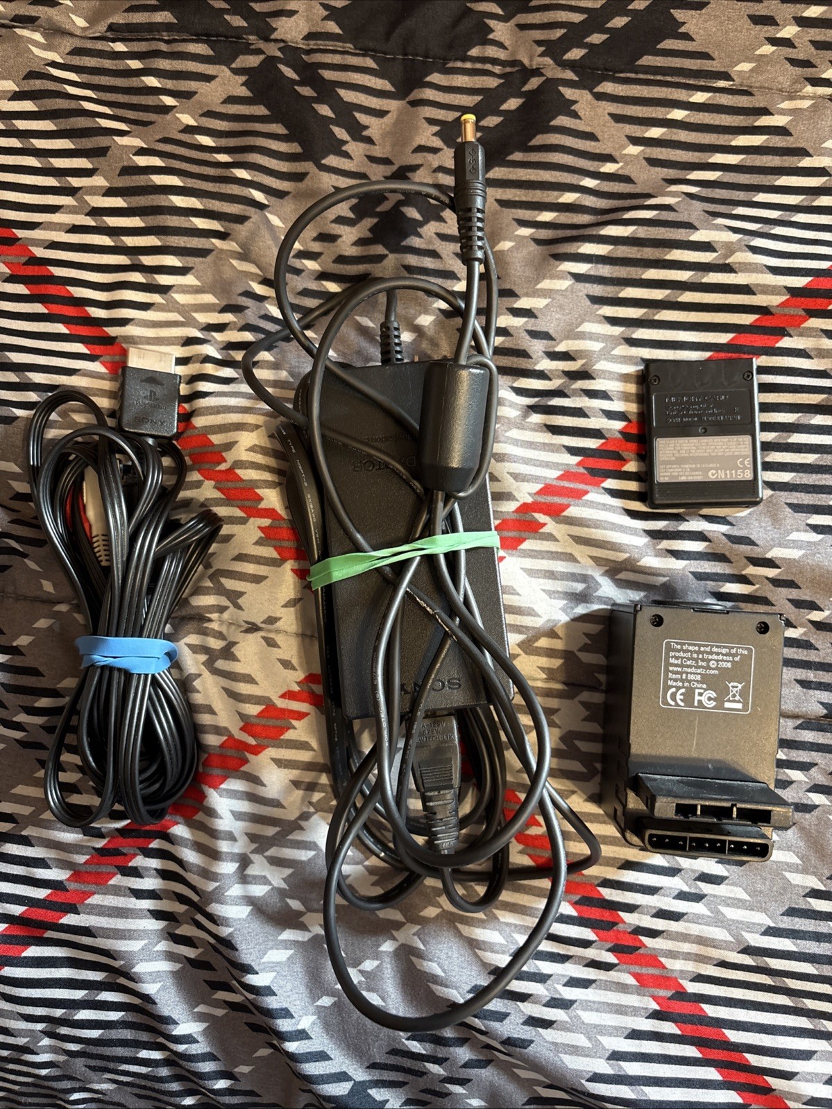 Sony PS2 Console, Controller, 4 Player Adaptor, Wires, 8mb Memory Card,& 7 Games