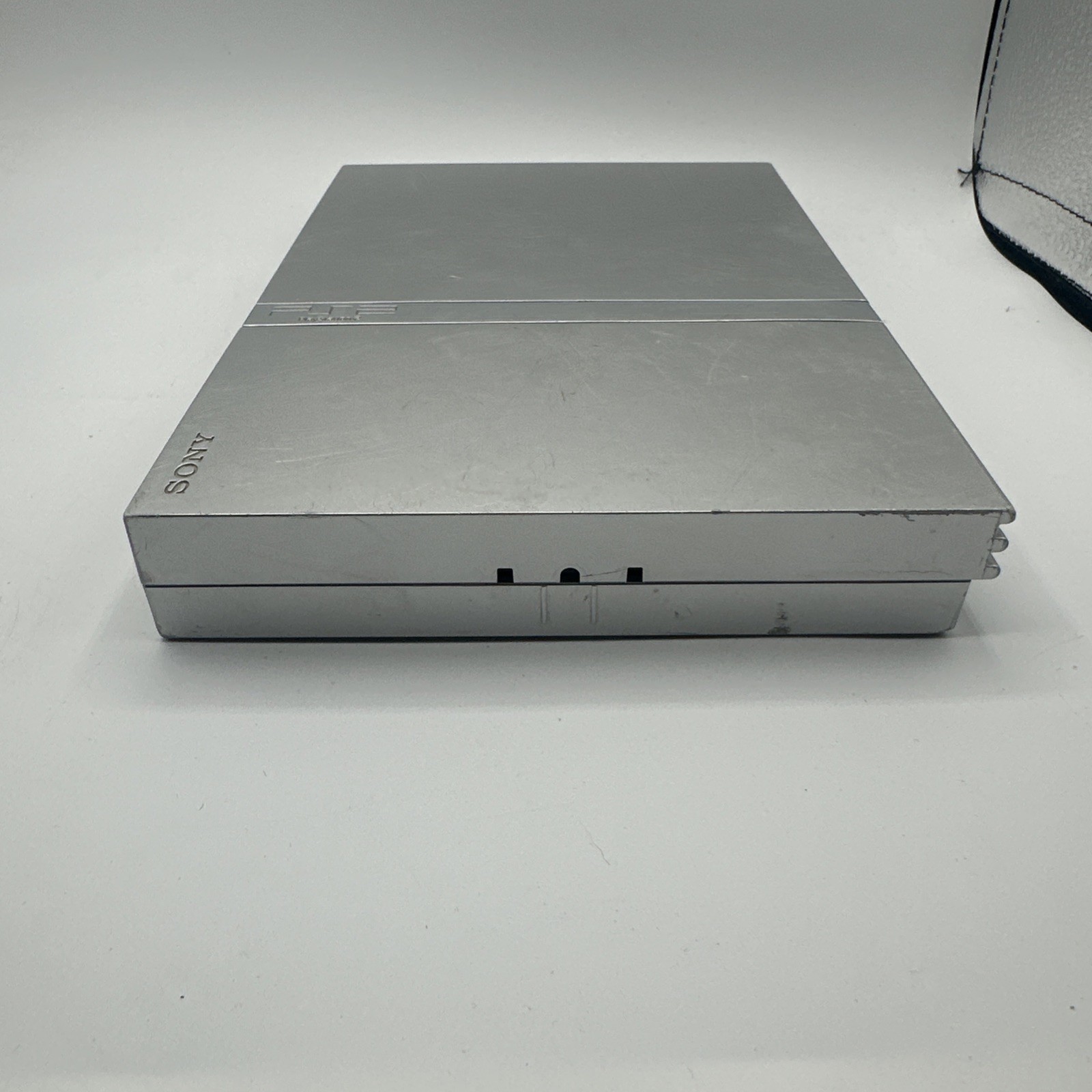 Sony PlayStation 2 PS2 Slim Silver Console SCPH-77001 – Disc Not Spinning