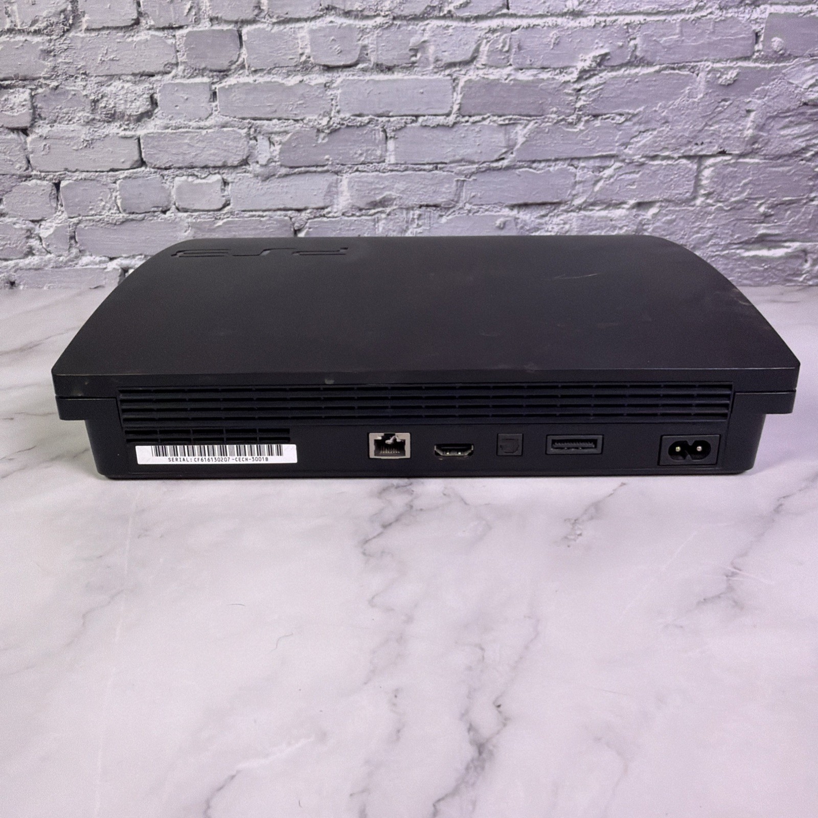 Sony PlayStation 3 Slim 160GB CECH-3001B, PS4 Controller & 8 Games – Tested ✅