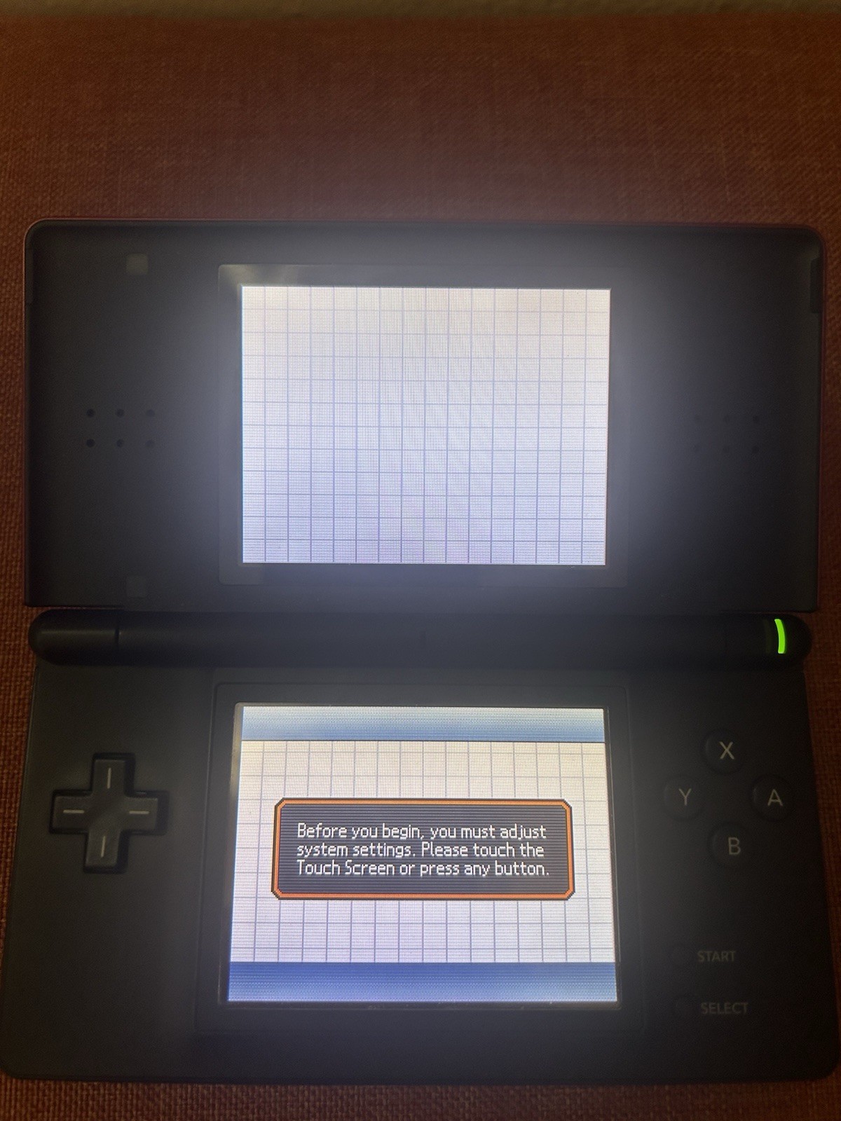 Nintendo DS Lite Red/Black Great Condition W Charger Stylus and Slot Cover￼