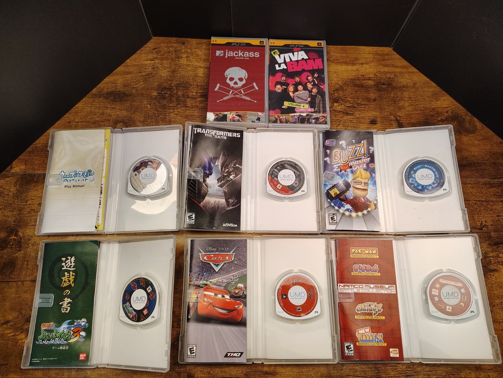 SILVER Sony PSP 2000 System Bundle With Games, Movies, And Cases