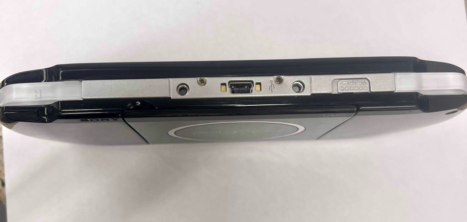 Sony PSP 3001 Portable Handheld Console System memory stick and 5 UMD Cleaned