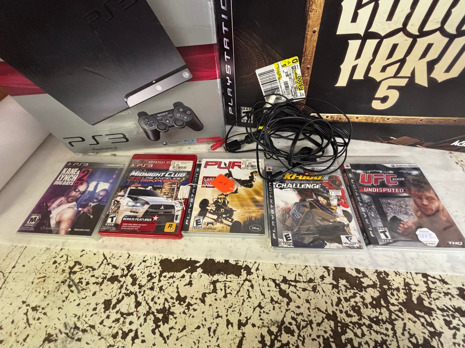 Sony PlayStation 3 – Slim 250GB Console – Charcoal Black & Guitar Hero & Games