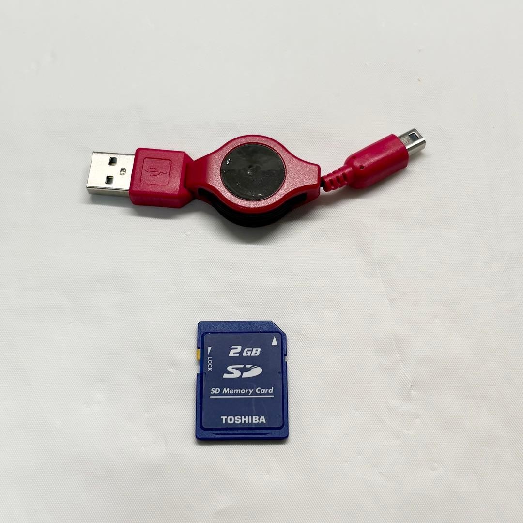 Nintendo 3DS Flare Red with compatible charger and SD card, confiRMed working.