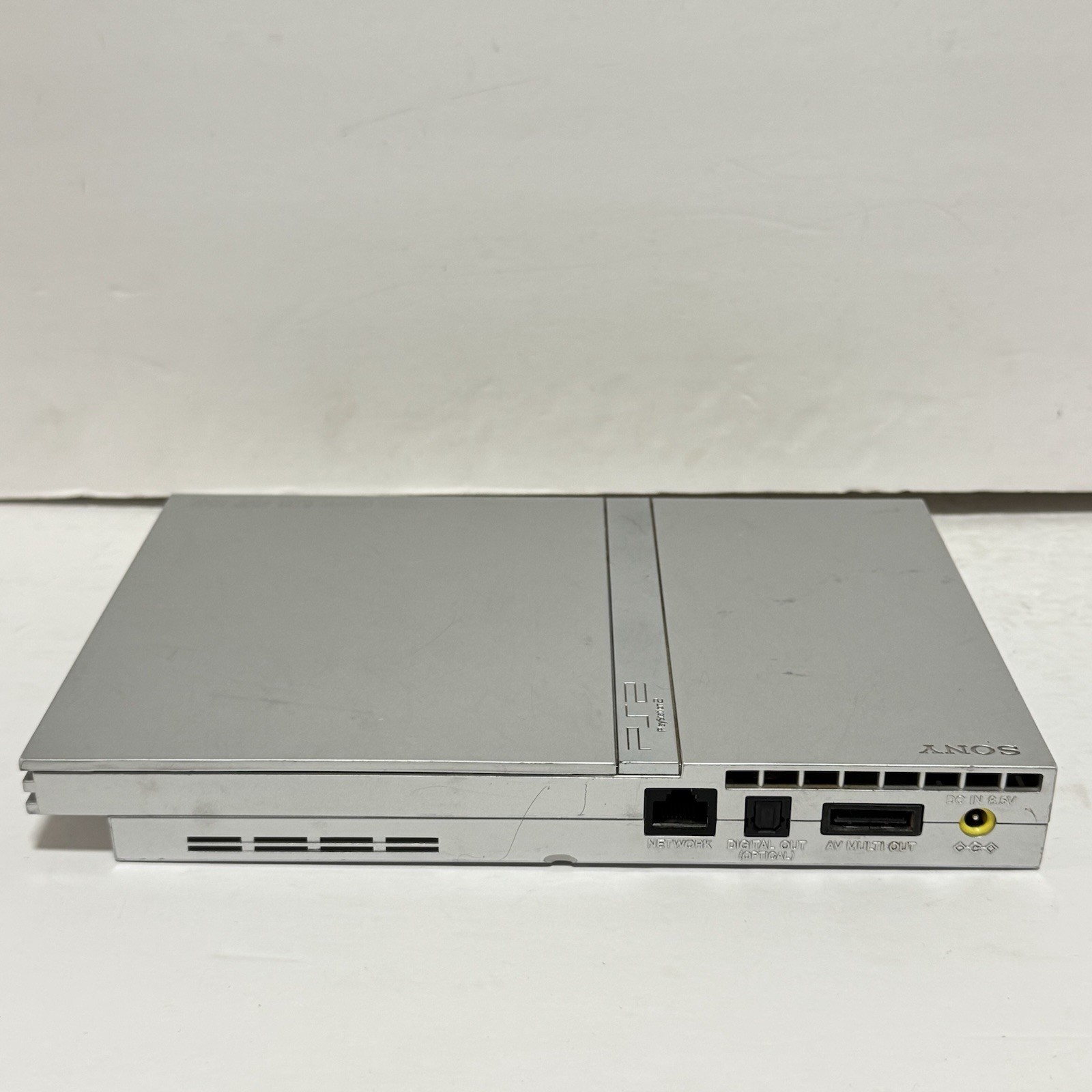 Sony PS2 Slim Silver SCPH-77001 Console W/ Av Cable And Game