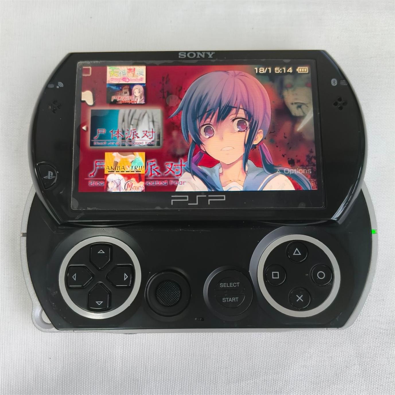 Sony PSP GO console Black with Charger PSP-N1003 Screen with protect