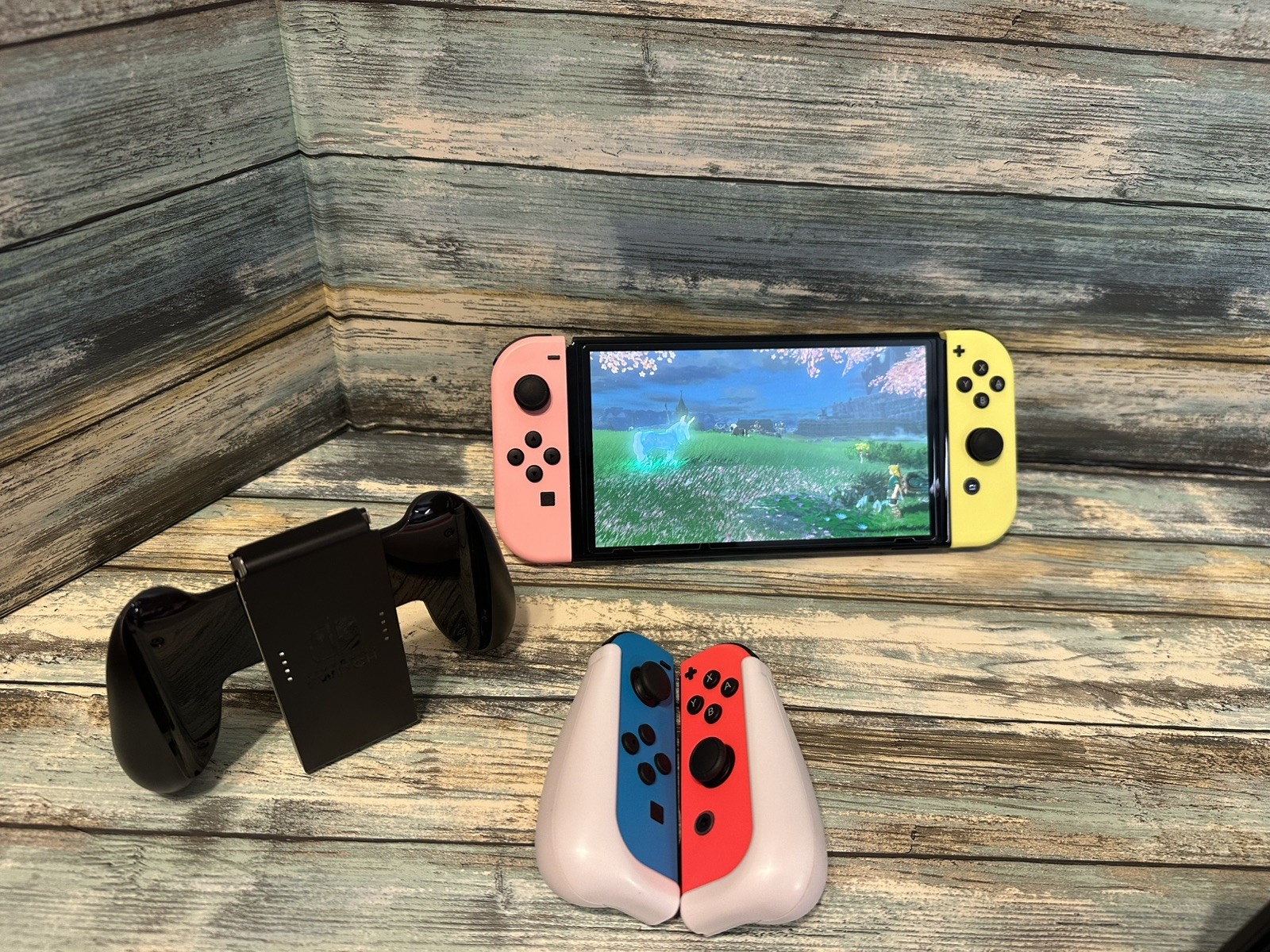 Nintendo Switch OLED Model w/ Neon Red & Neon Blue JoyCon Console + 2 JoyCons