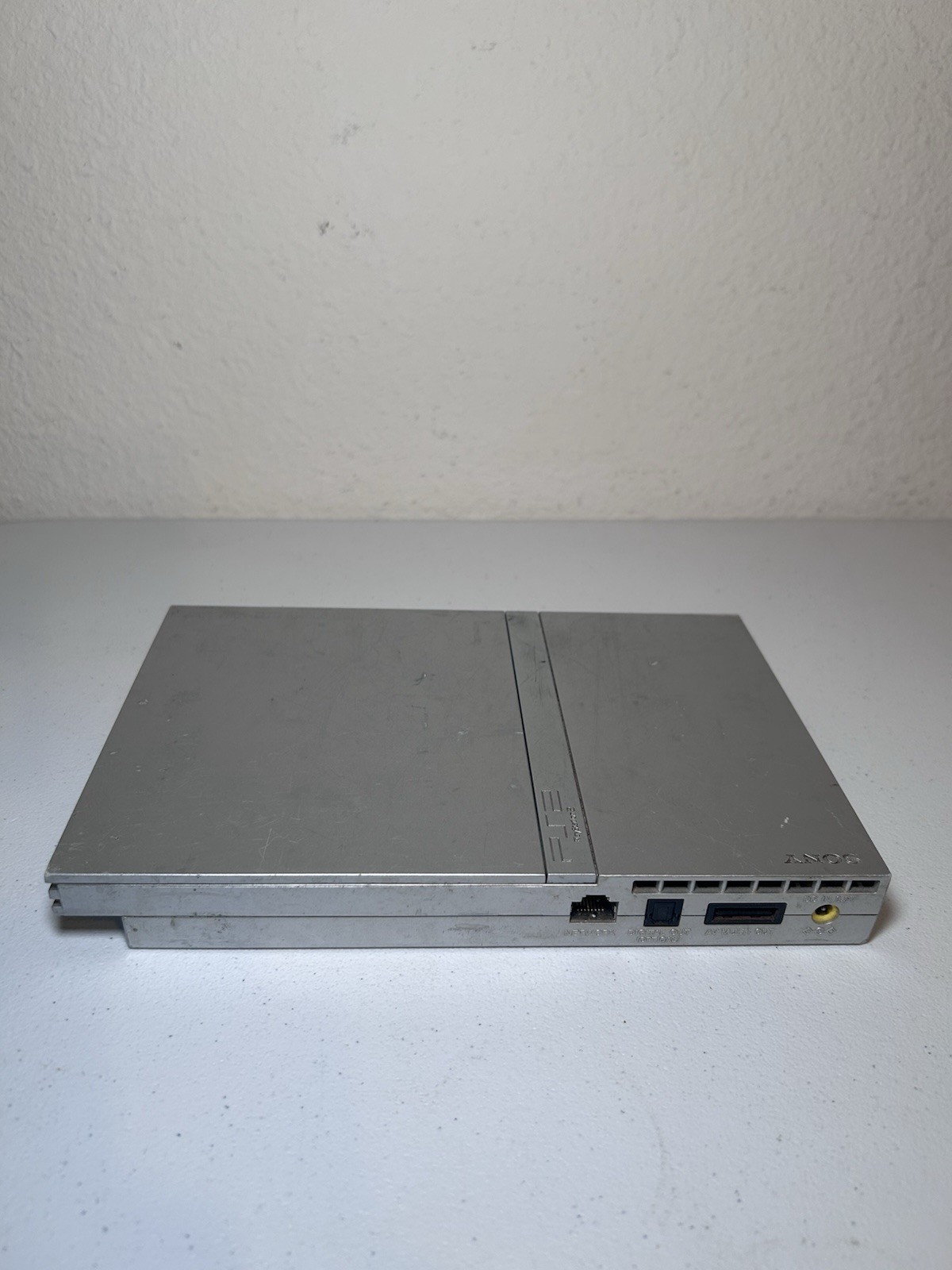 Sony PlayStation 2 Slim Silver (SCPH-79001) Bundle With Controller And Cords