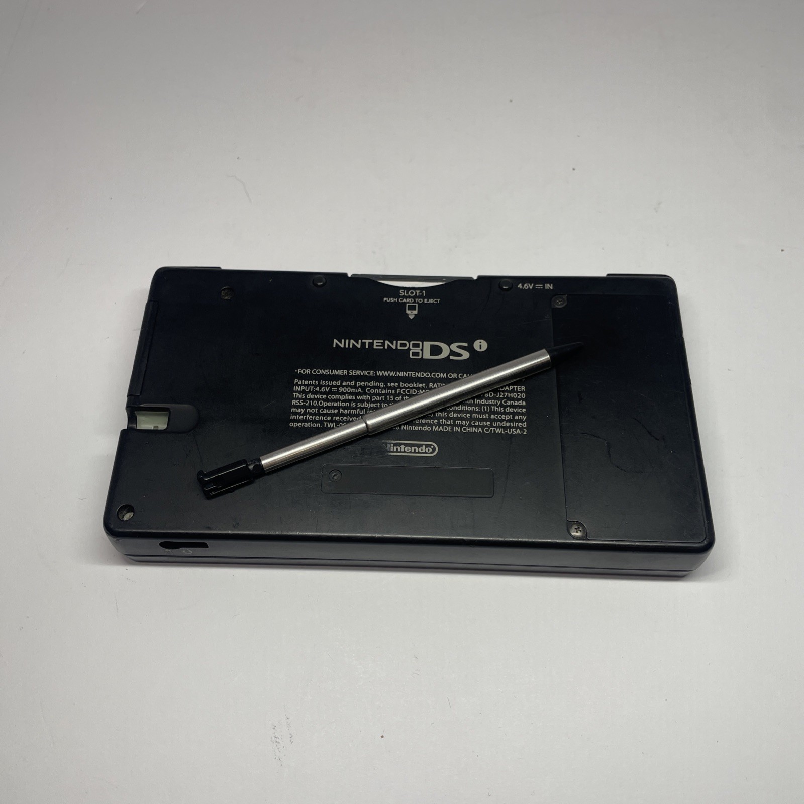 Nintendo DSi TWL-001 Black handheld system w/ Mario Bros -needs charger