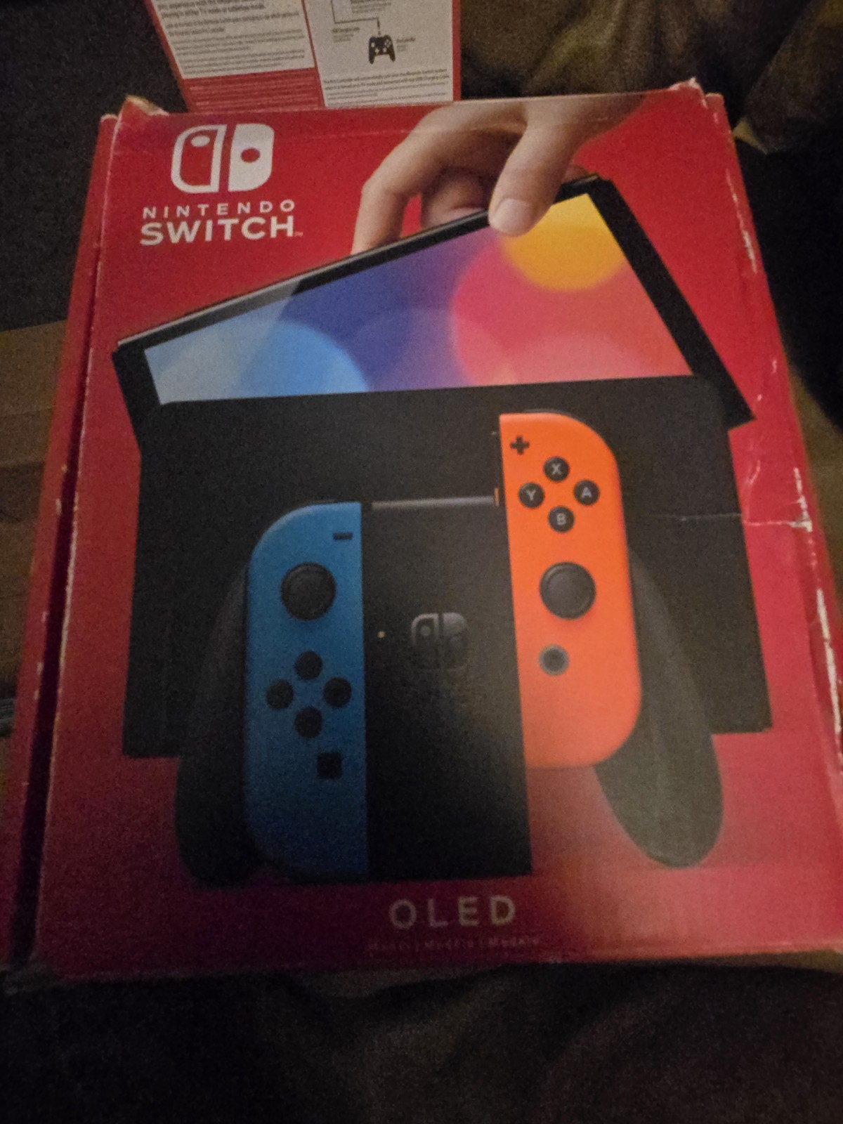 Nintendo Switch OLED Model HEG-001 Handheld. – 64GB – Black/Neon Red/Neon Blue