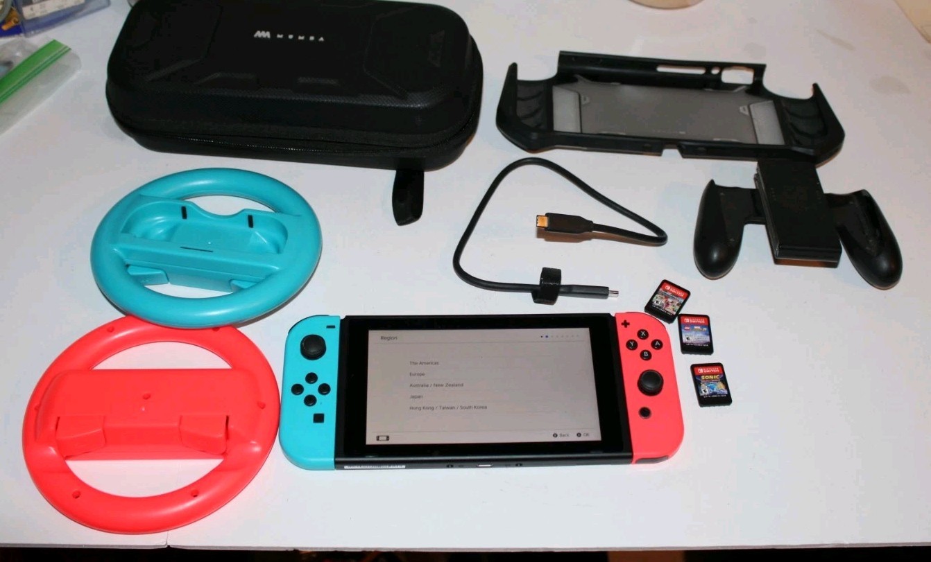 Nintendo Switch Console Model HAC-001(01) Bundle w/ 3 Games, Carrying Case, Extr