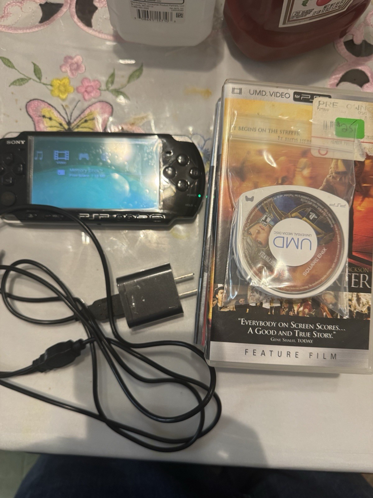 PSP 3001 Black bundle 4games 4 Movies / Charger / Battery.