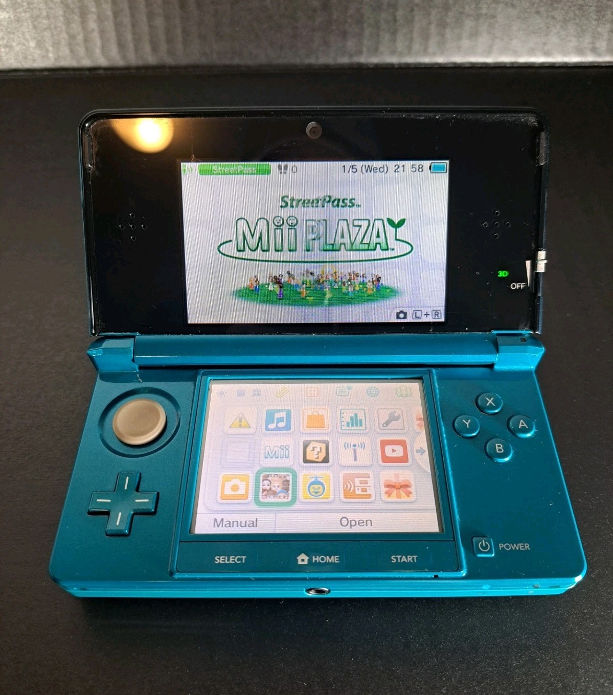 Nintendo 3DS Aqua Blue Handheld Console 3D Technology w/ Nyko Powerpak & 4GB SD