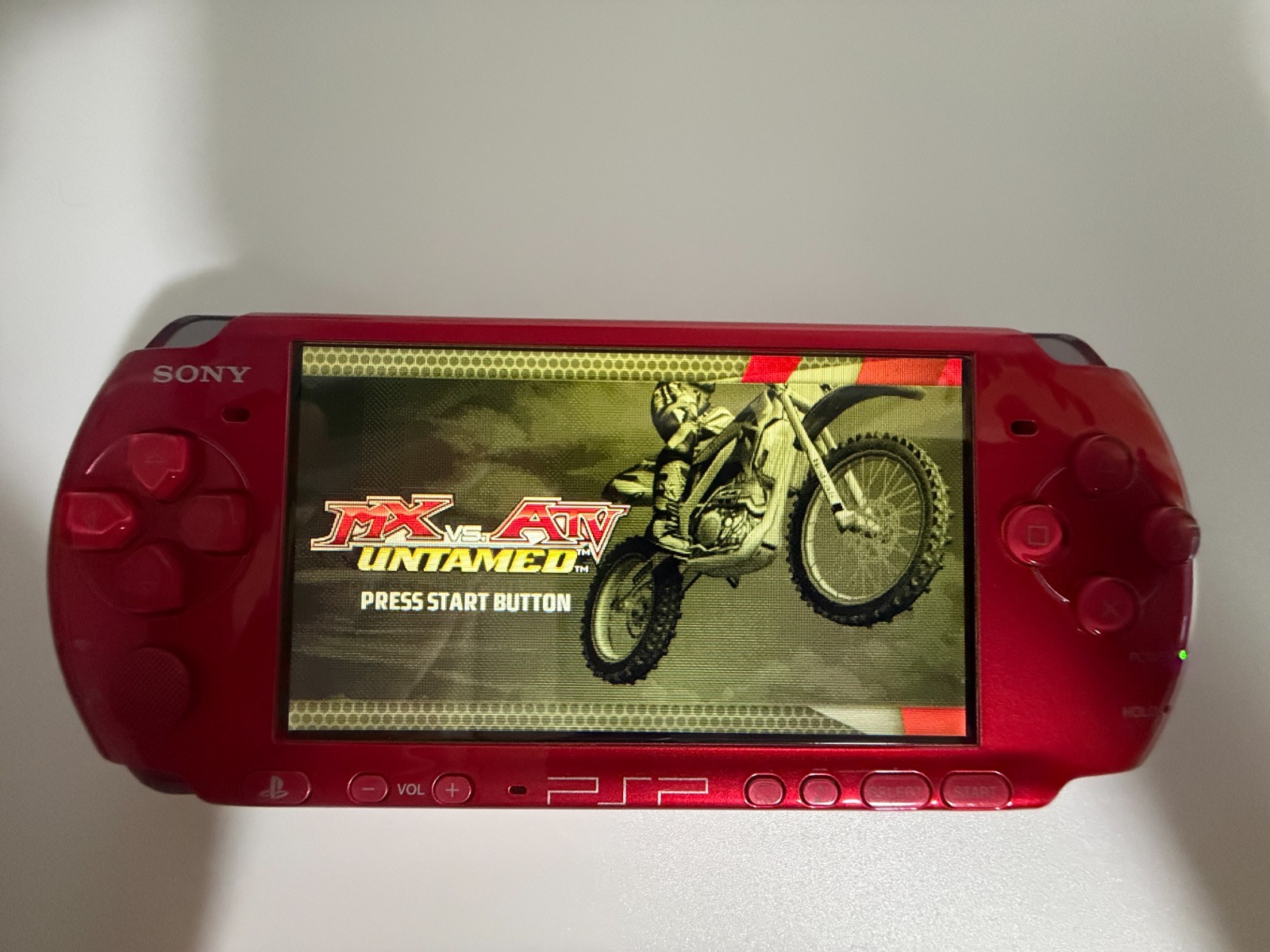 Sony PSP 3000 Radiant Red Racing Bundle MX vs ATV Untamed 4GB Memory Card Charge