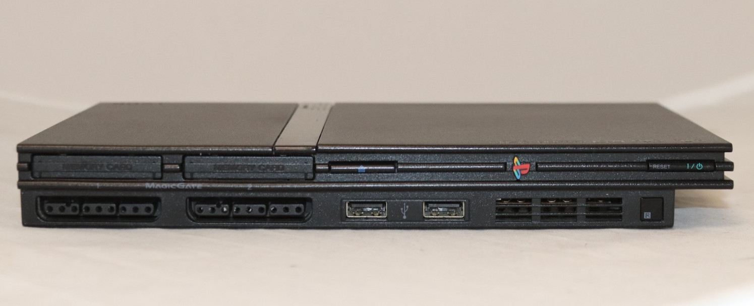 Sony PlayStation 2 Slim (SCPH-75001) W/ two controllers