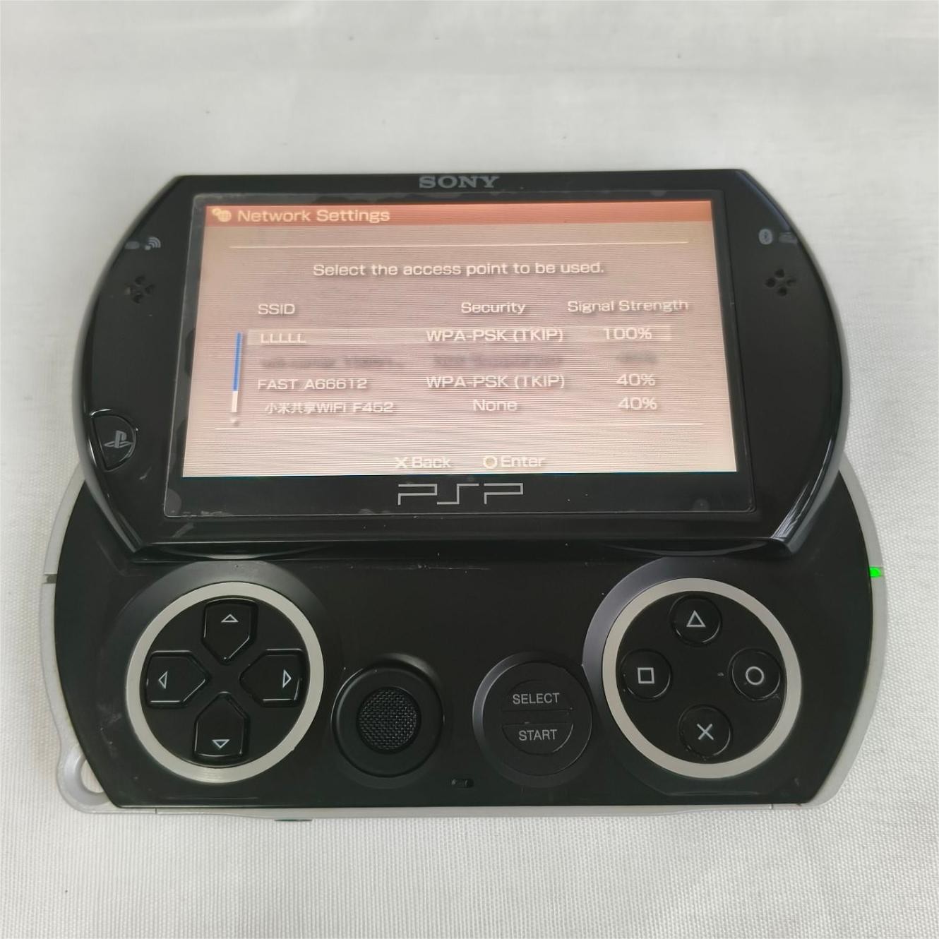 Sony PSP GO console Black with Charger PSP-N1003 Screen with protect