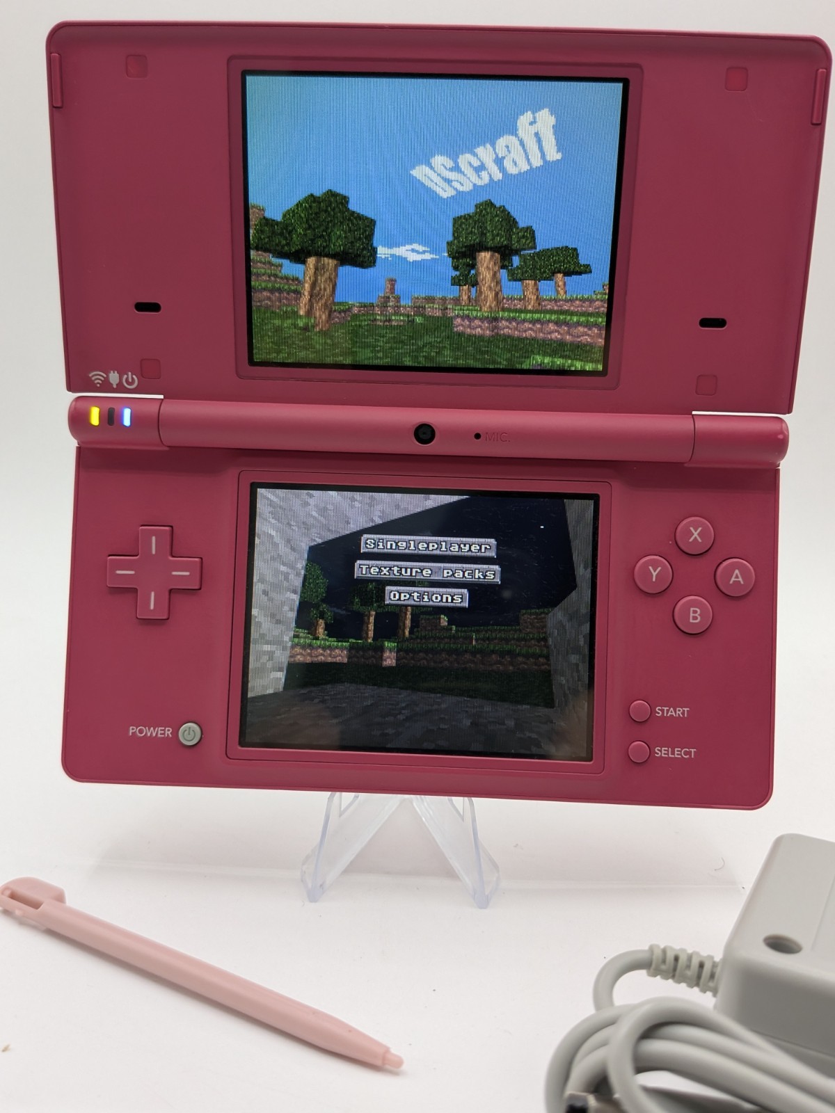Nintendo DSi Hot Pink – Includes Preloaded Library (Large Collection)