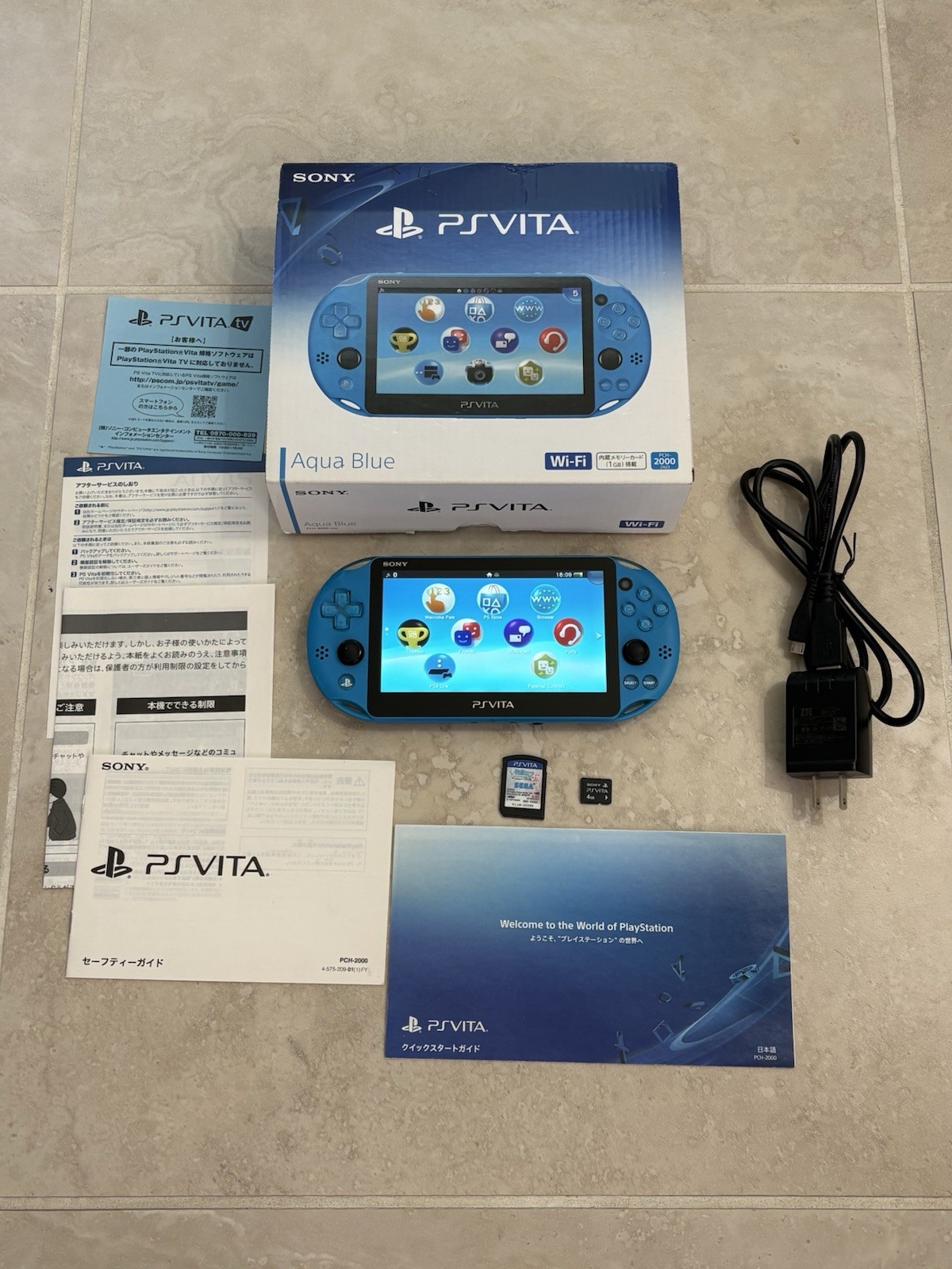 Sony PS Vita PCH-2000 Complete In Box – Aqua Blue 4GB Very Good Condition