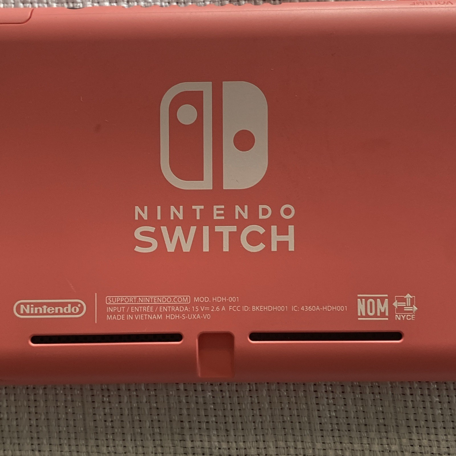 Nintendo Switch Lite Coral Handheld Console tested working